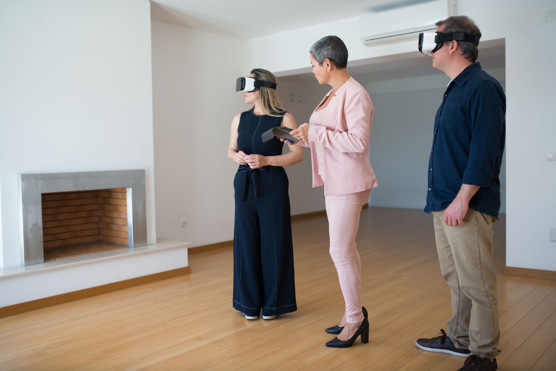 Off the plan 3D virtual tour: Buyers reviewing an apartment at full scale before it is built