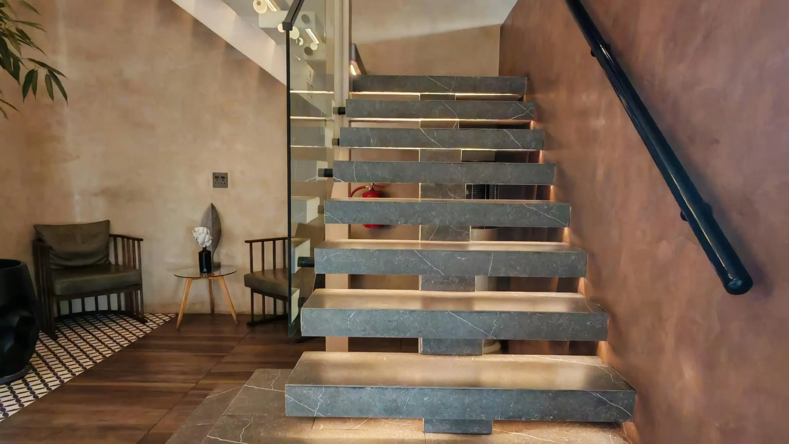 Designing a custom staircase in oak, brass and glass