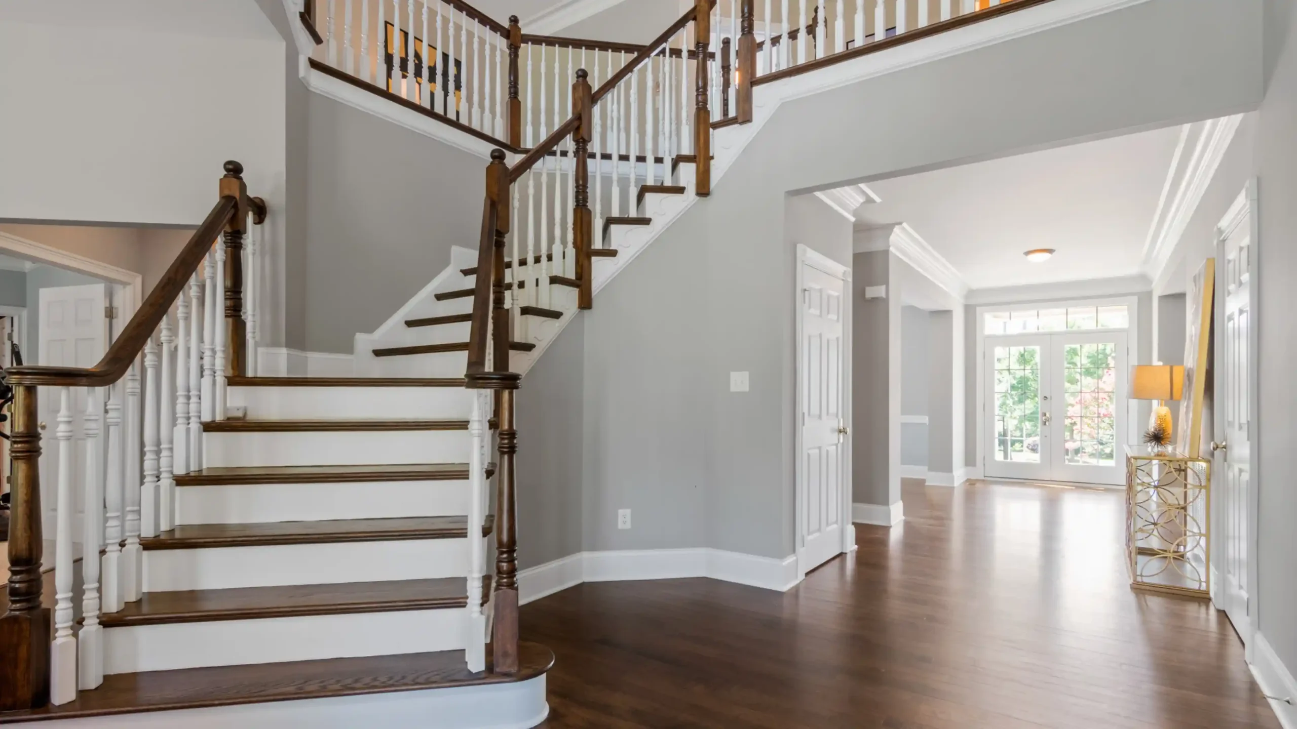 Designing a custom staircase in oak, brass and glass