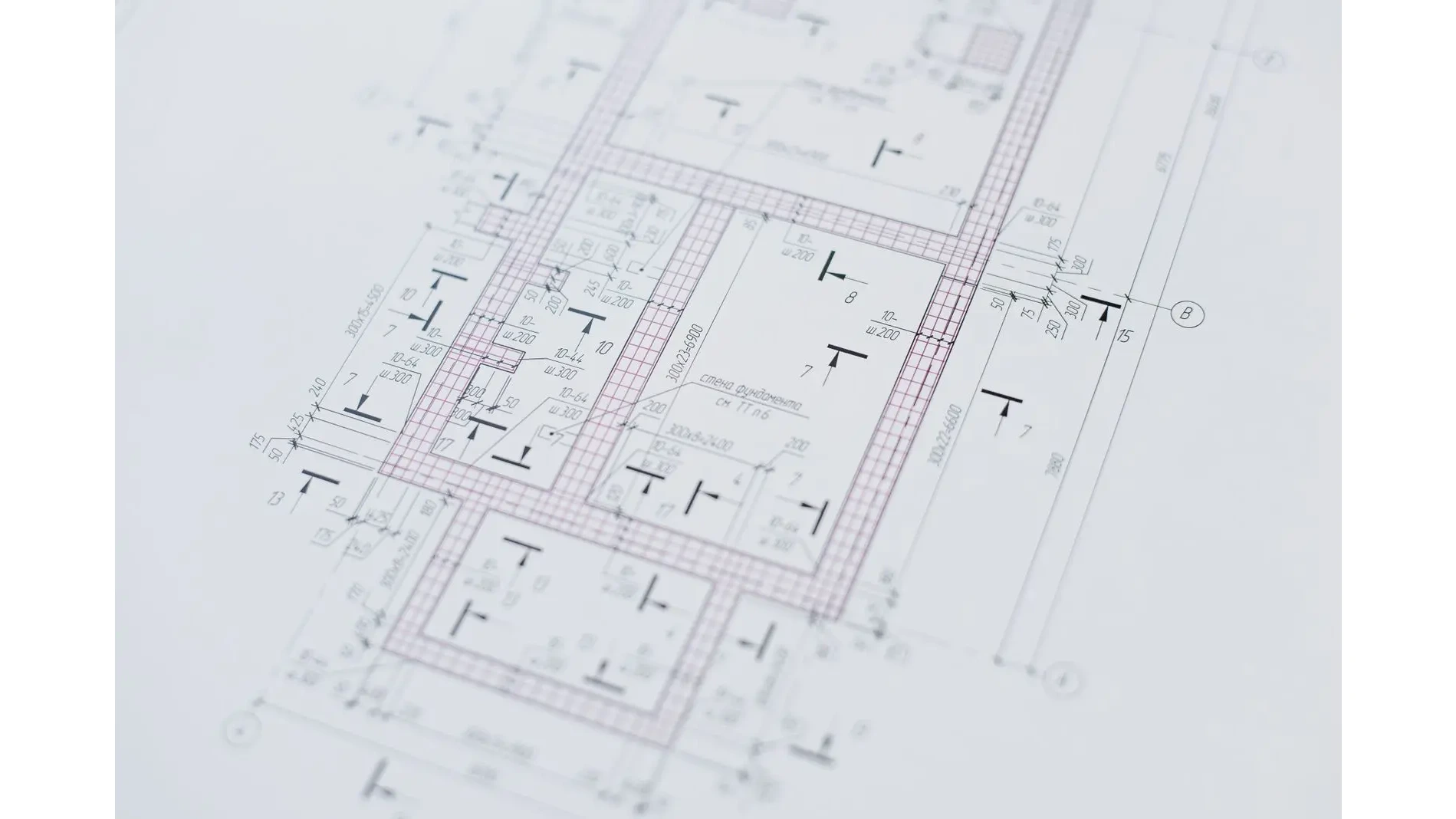 Custom home builders Sydney reviewing the floor plan layout with the client