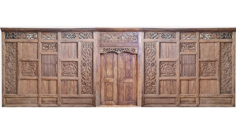 Carved timber gate panel proposed for the garden boundary entry