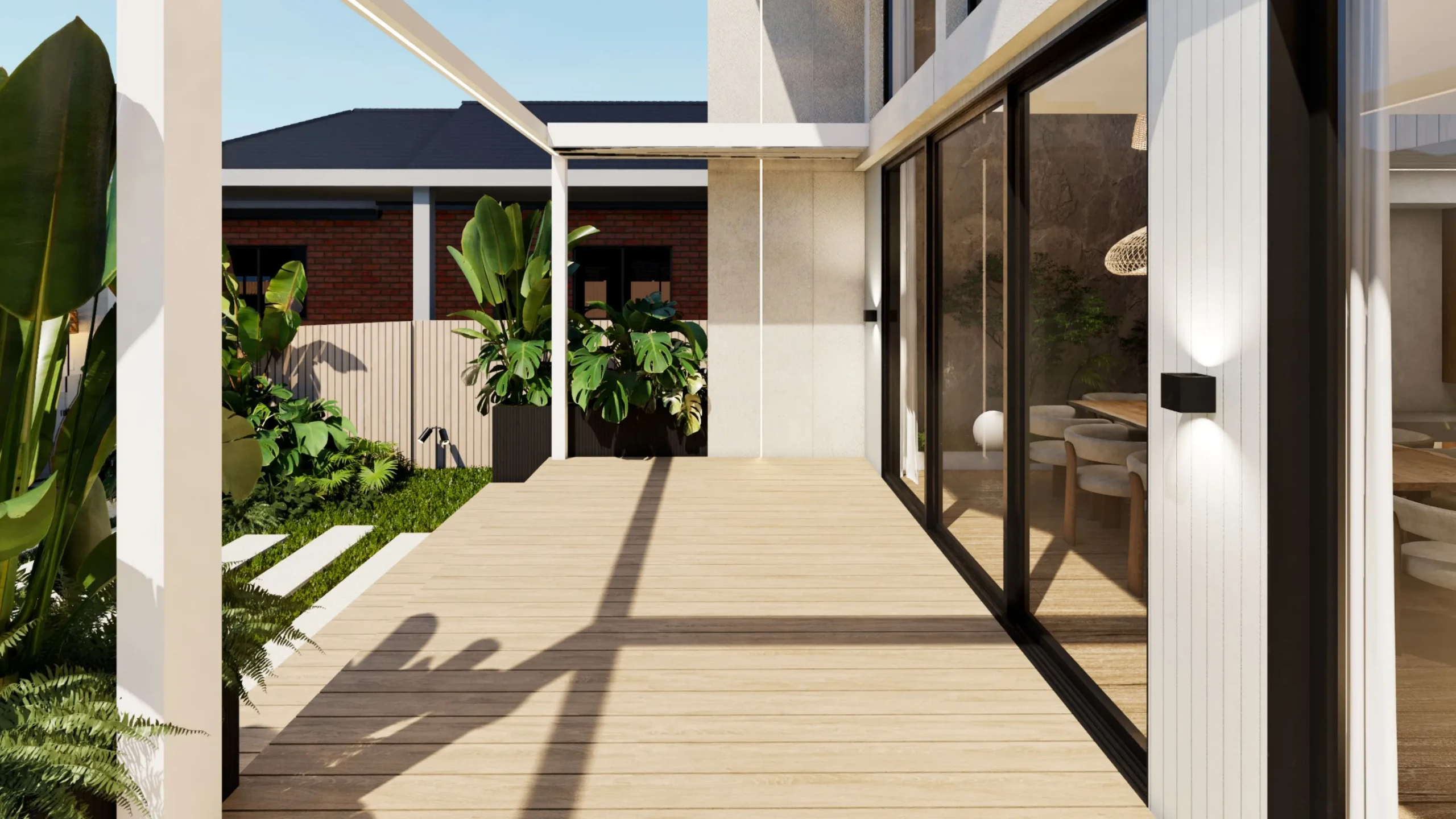 Composite decking boards running toward the glazed facade, showing board width and laying direction