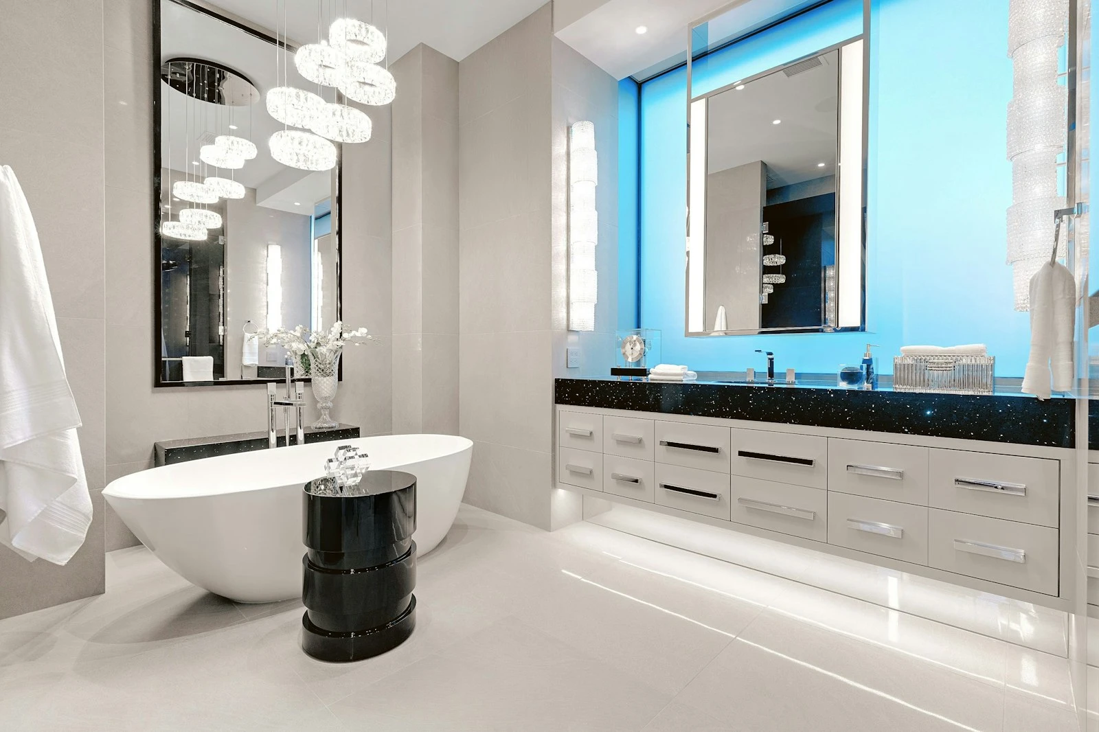 Bright bathroom with a freestanding bath and stone floor
