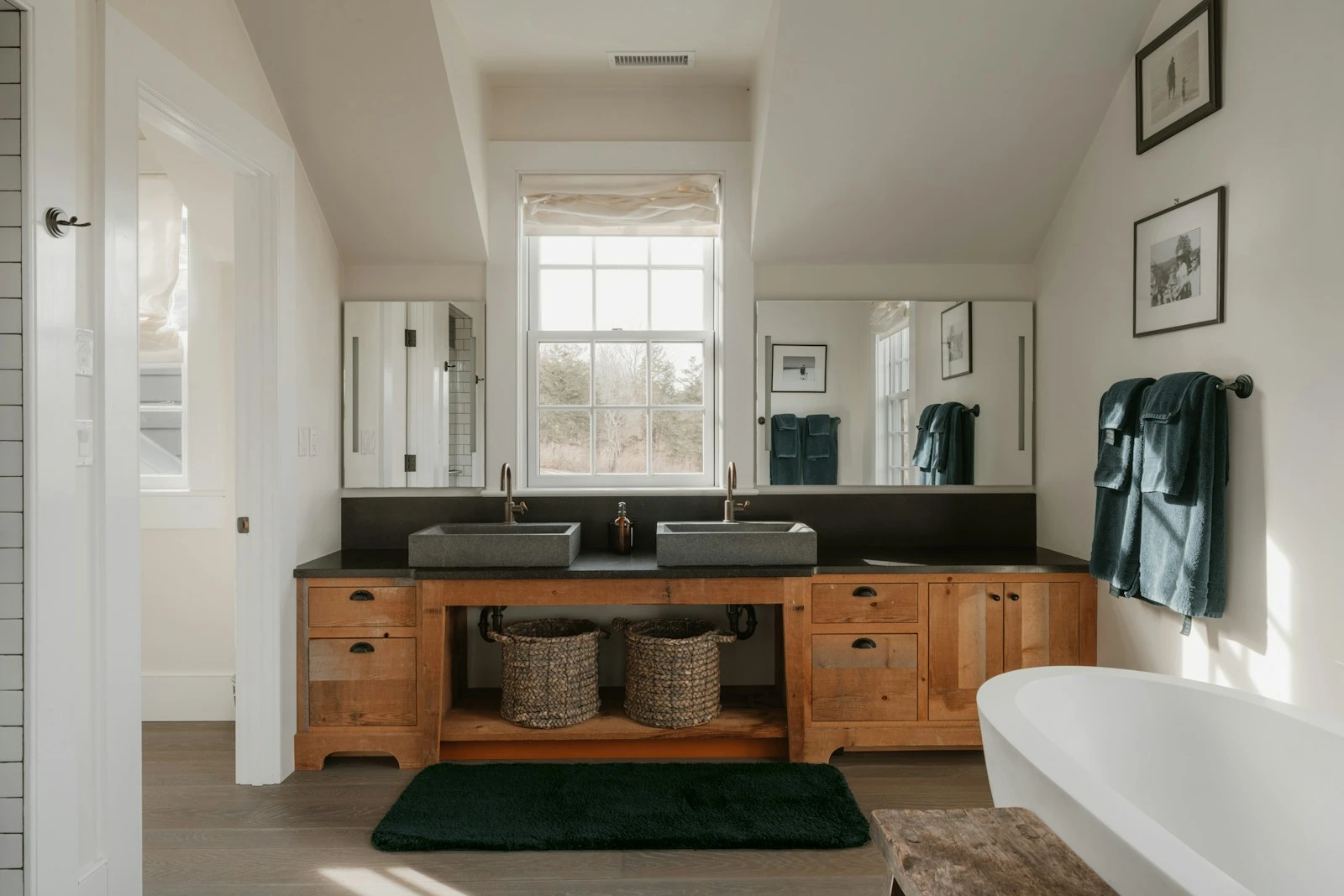 Renovated bathroom with timber vanity and stone