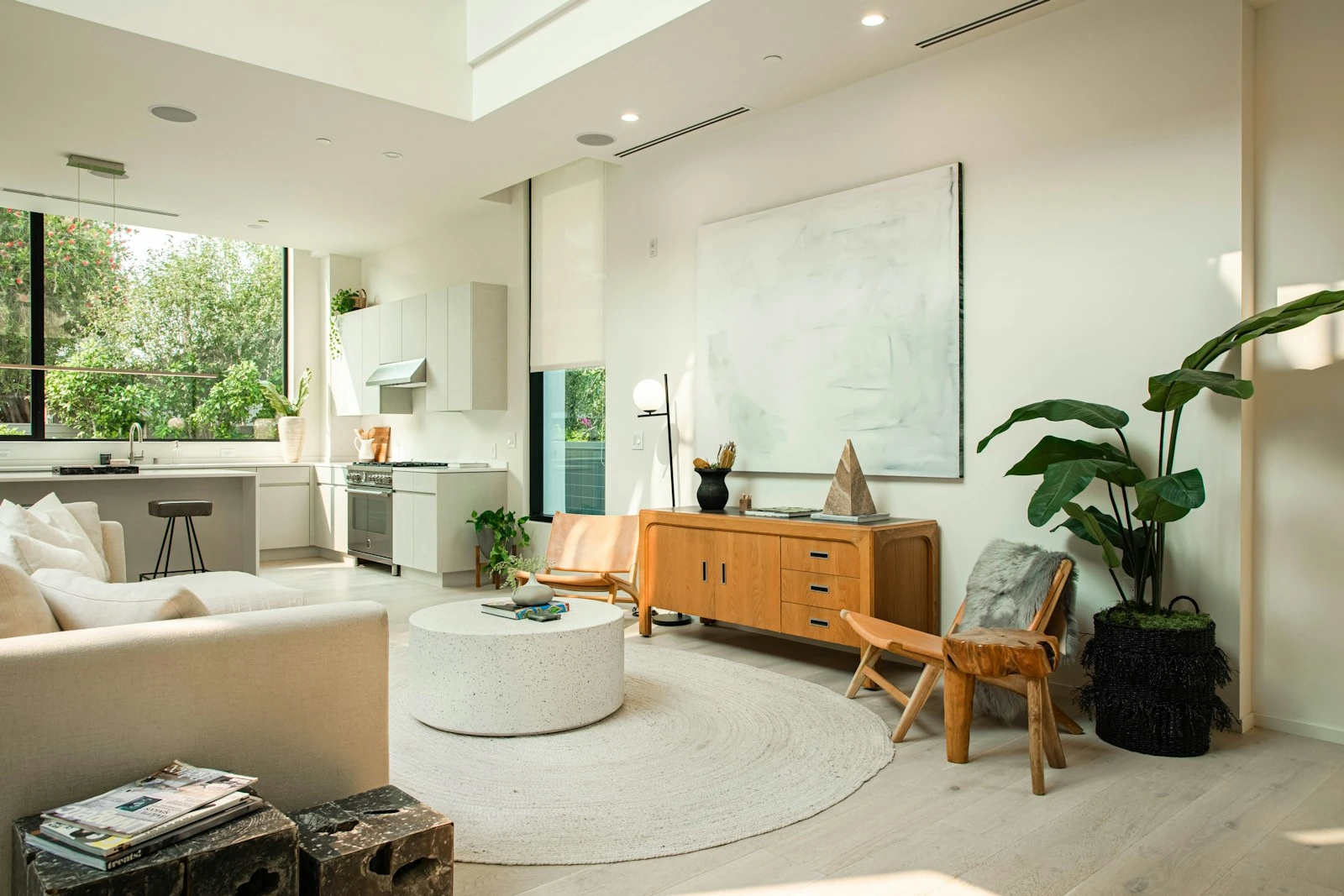 Living room with layered planting and warm timber