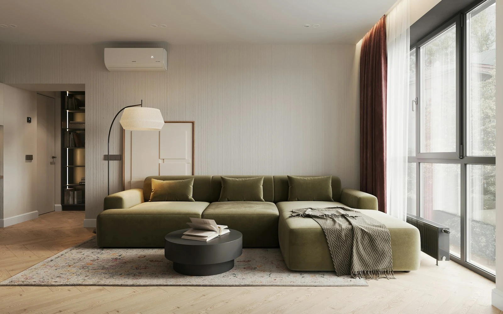 Elegant apartment living room with a deep sofa and tall windows