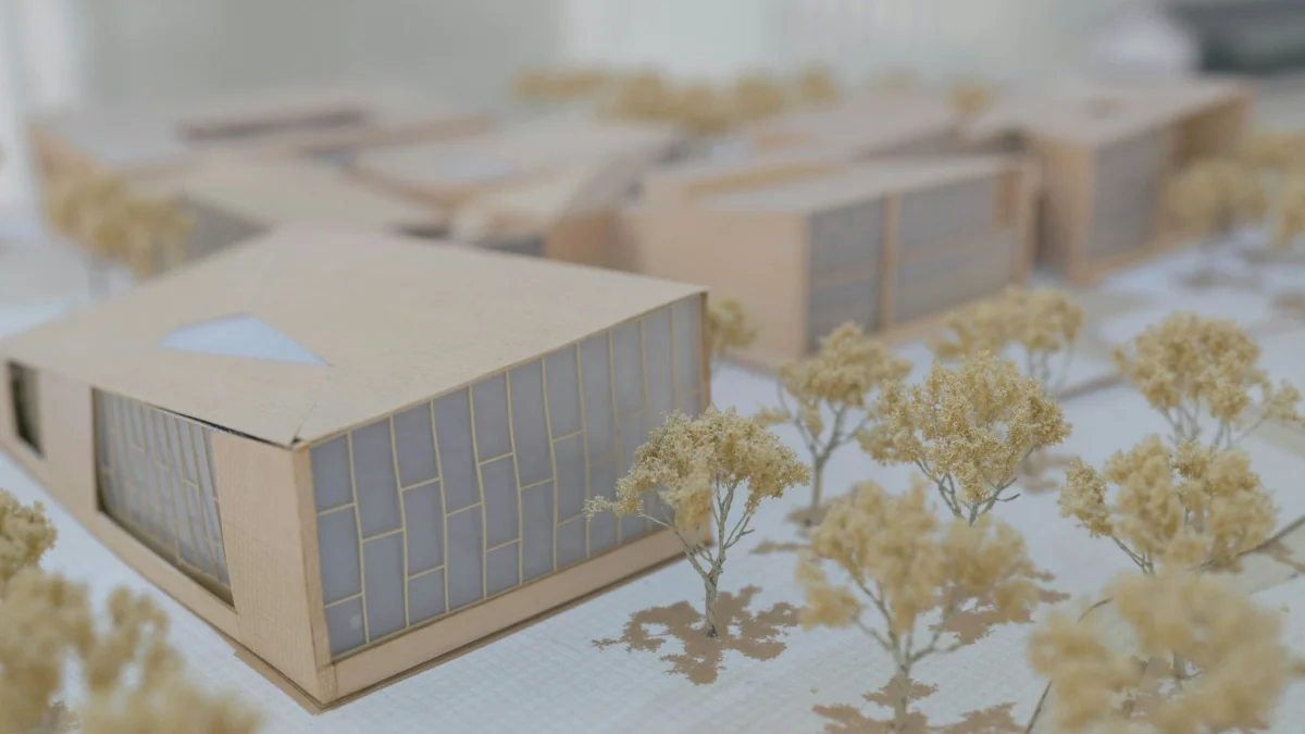 White and brown scale model of a proposed building