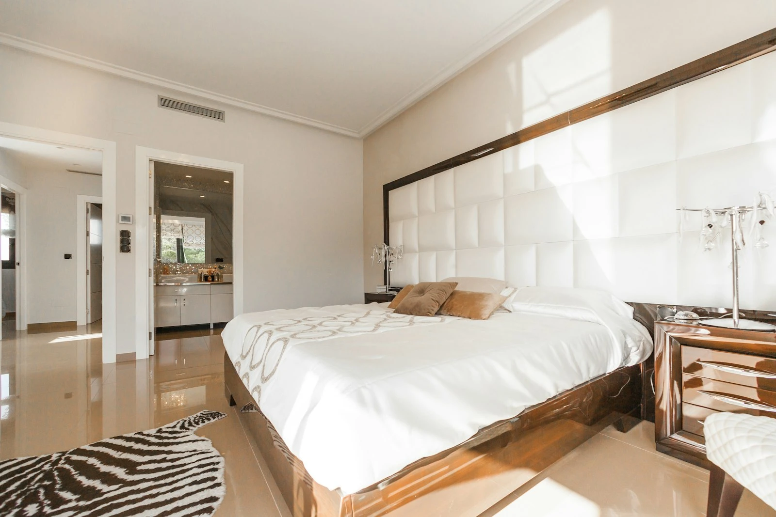 Calm white bedroom with soft natural light