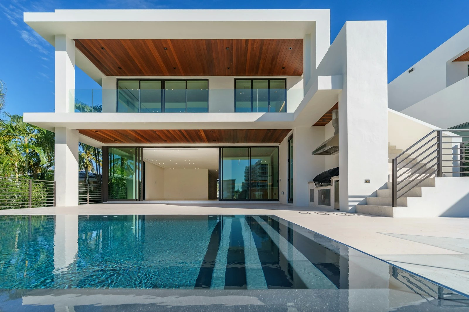 Modern villa with a pool and deep timber soffit