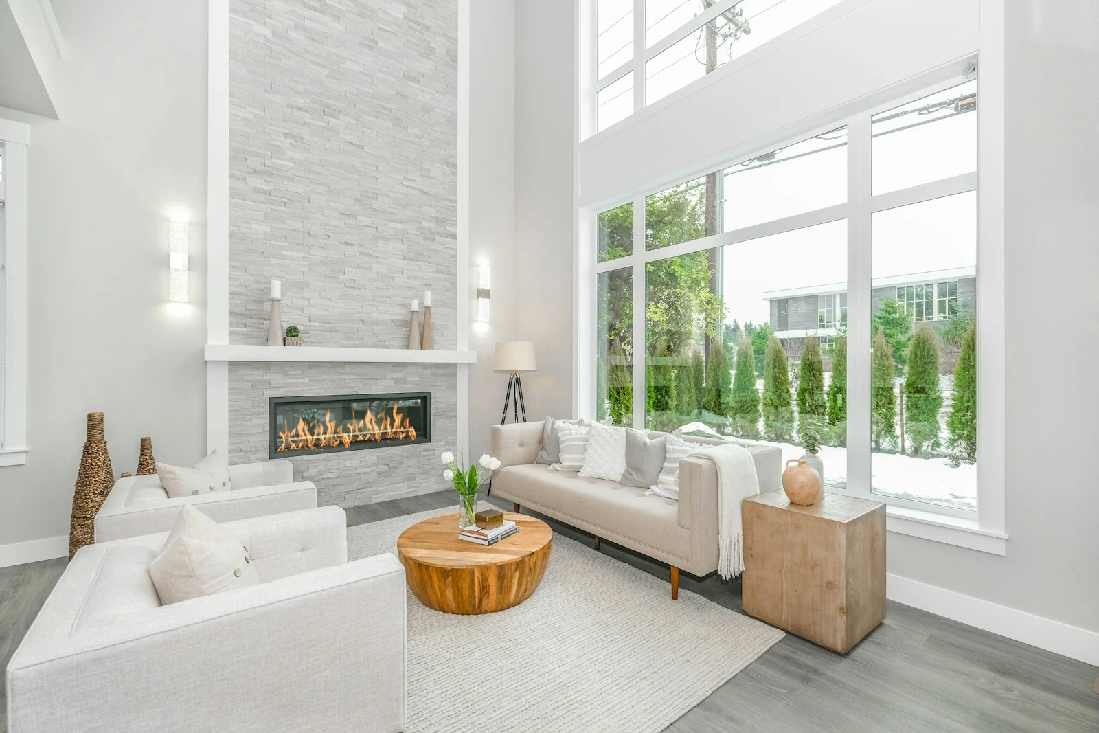Light filled living room with full height glazing
